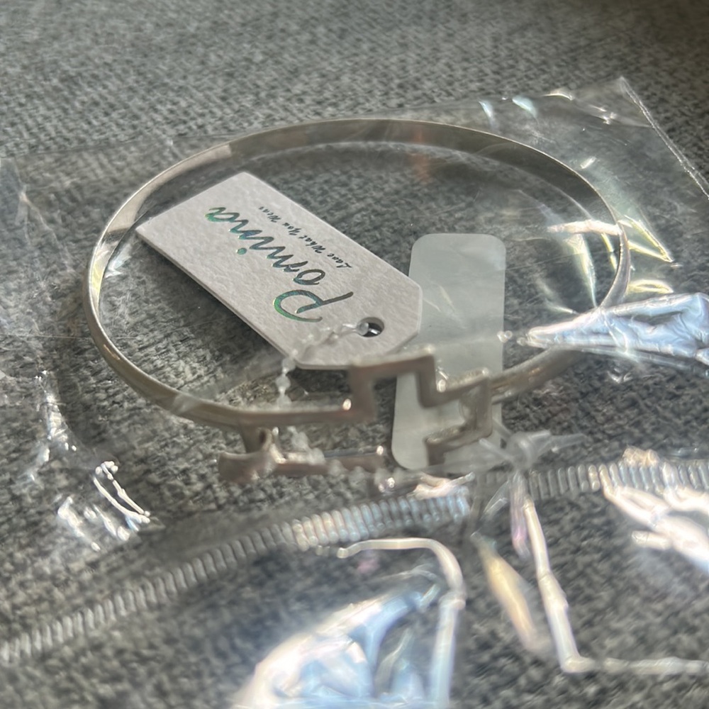 Simple Metal Bangle Bracelet Featuring Cross Charm Closure - Picture 2 of 4